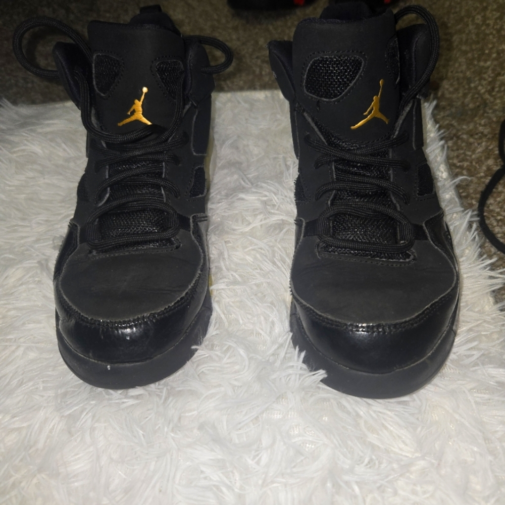 Black and Gold Jordan Sneakers